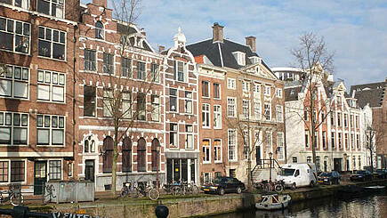 Beautiful old buildings in Amsterdam at the end of the bike and sail trip Ijsselmeer